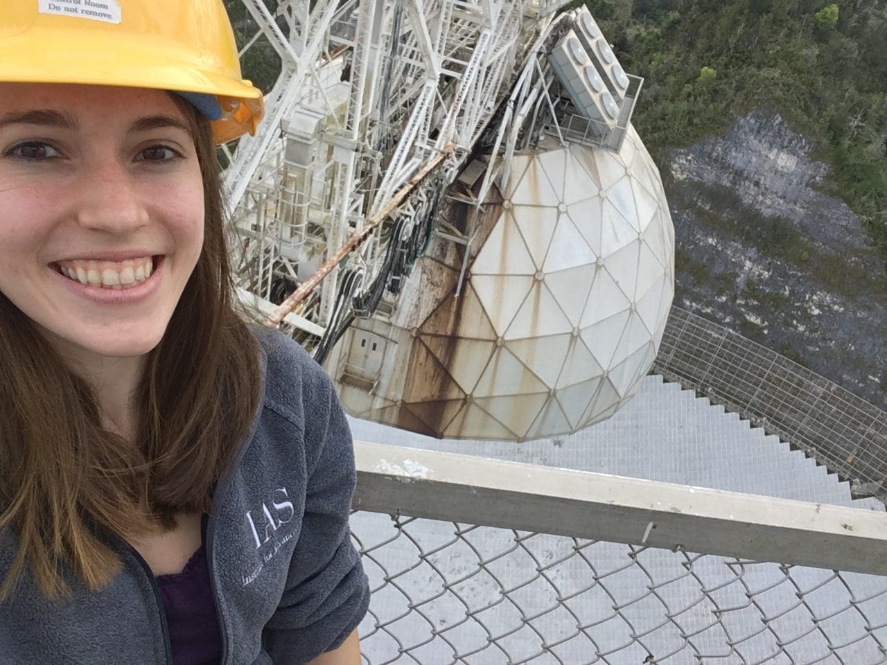 Susan smiling wearing a safety helmet.