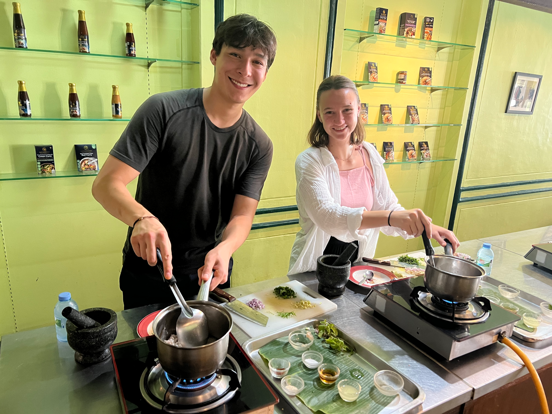 Mark Finamore ’25 and Alaina Shields ’25 cooking