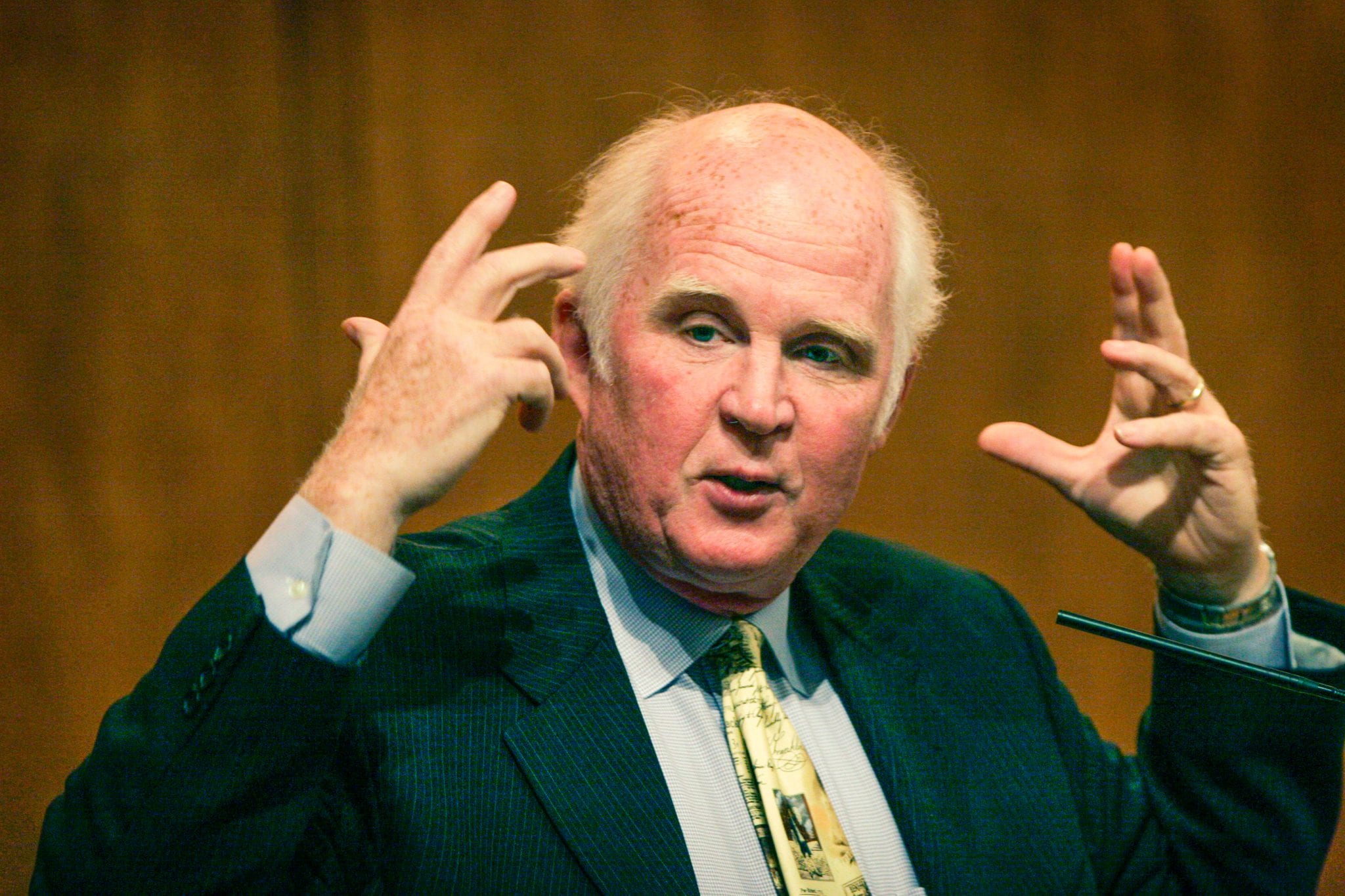 Taylor Branch speaking into a microphone.