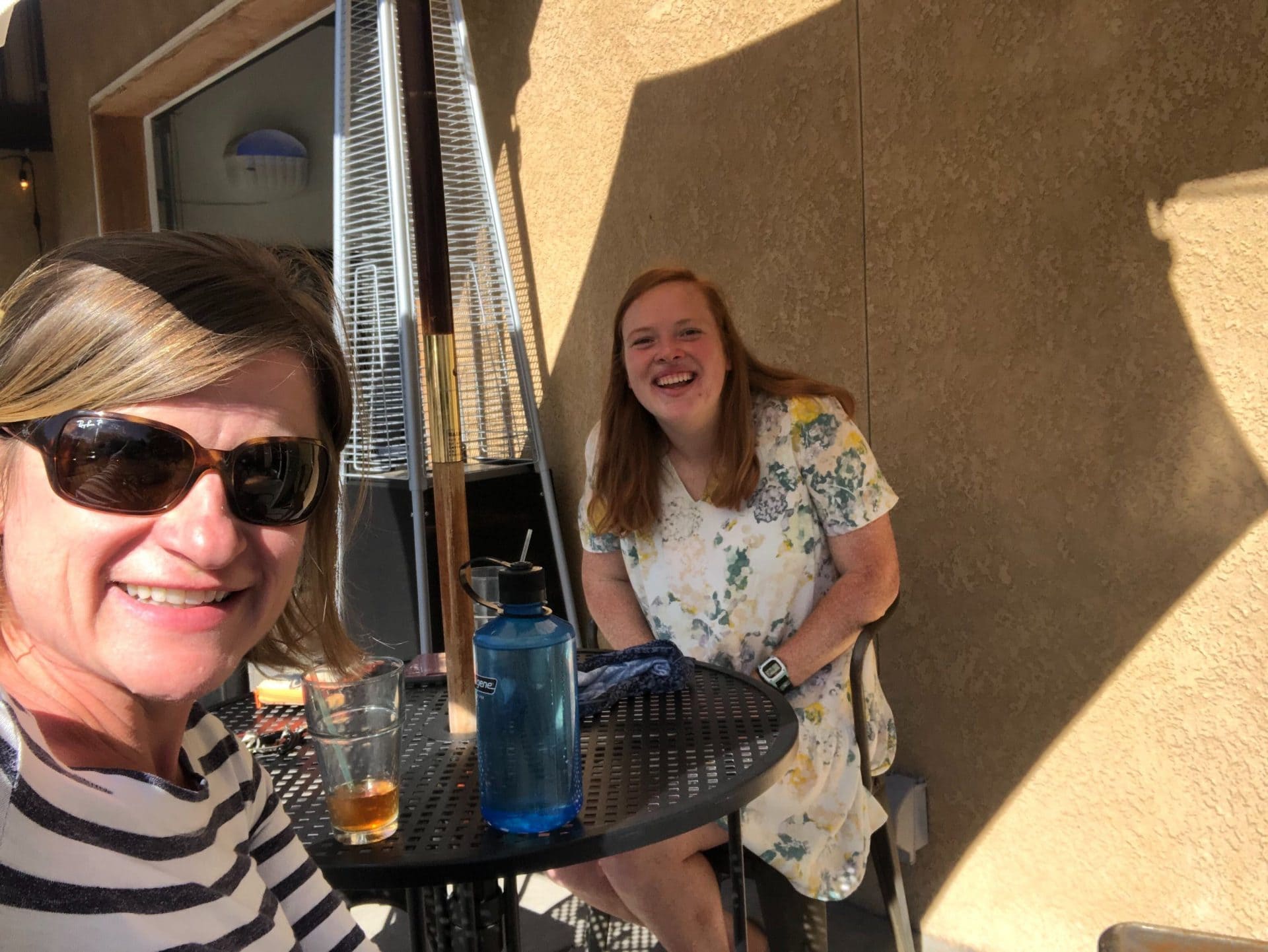 Kim and Virginia sitting outside at a restaurant in Colorado Springs, Colorado.