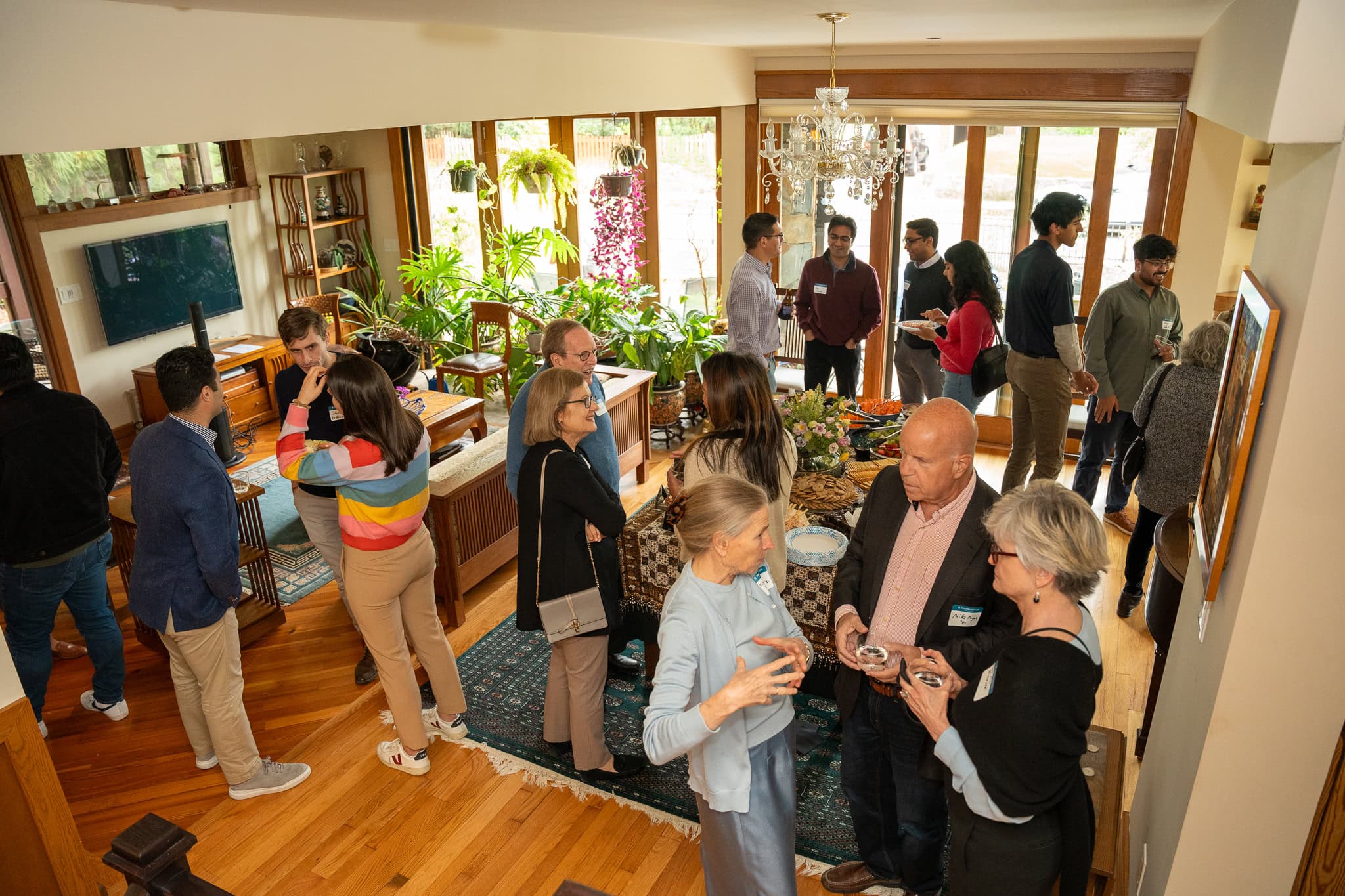 A room full of Morehead-Cain Alumni gathered for a social event