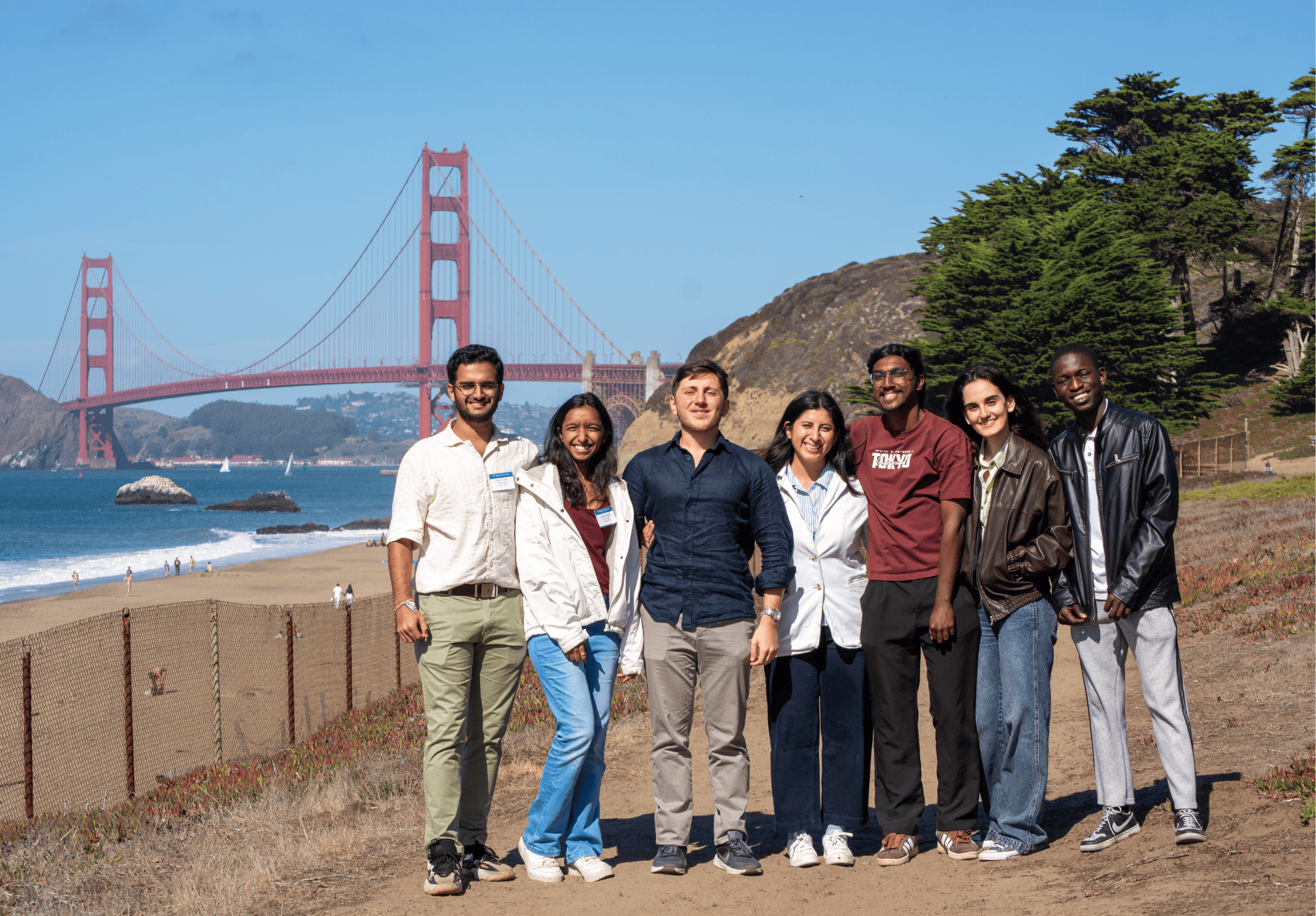 Students pose in front of the Golden Gate Bridge