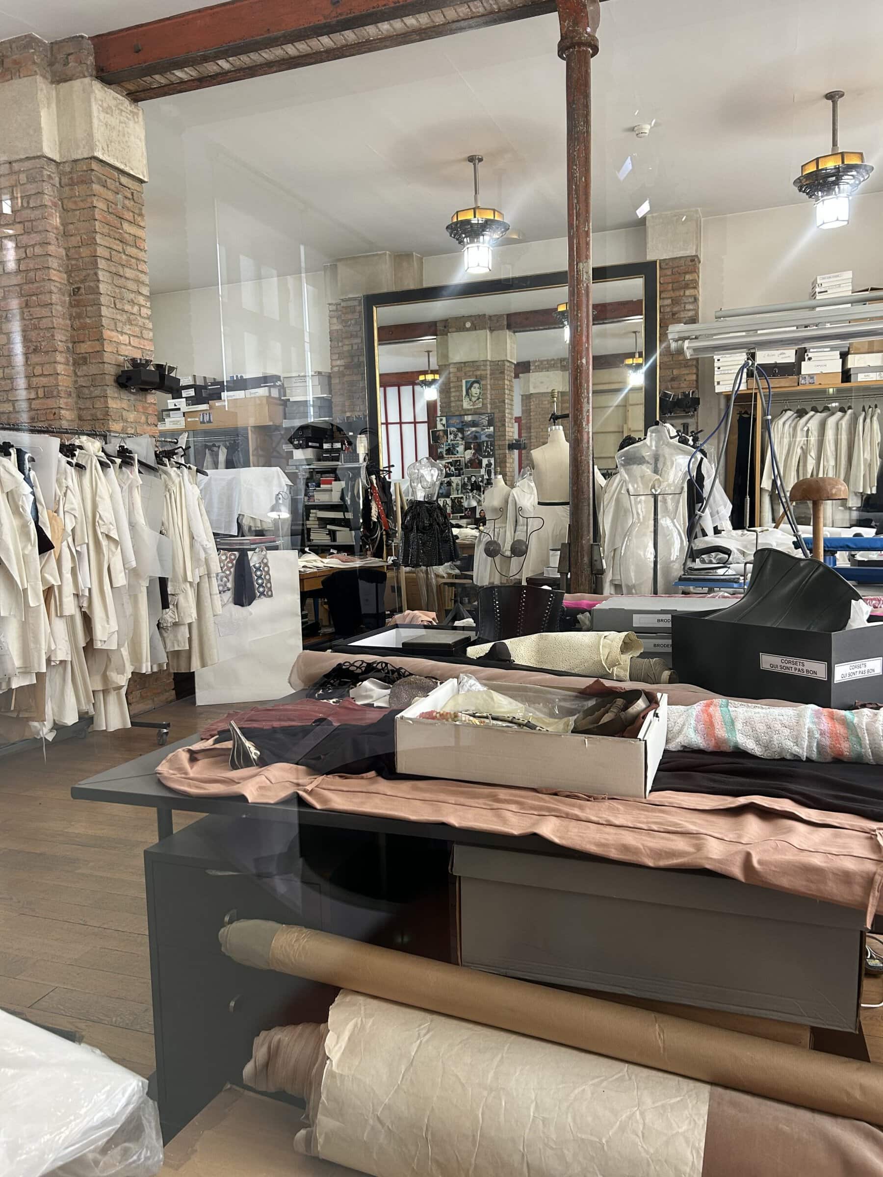 Azzedine Alaïa’s former studio contains garments, dress forms, fabric, sewing materials and worktables from the Azzedine Alaïa et l’Afrique exhibition.